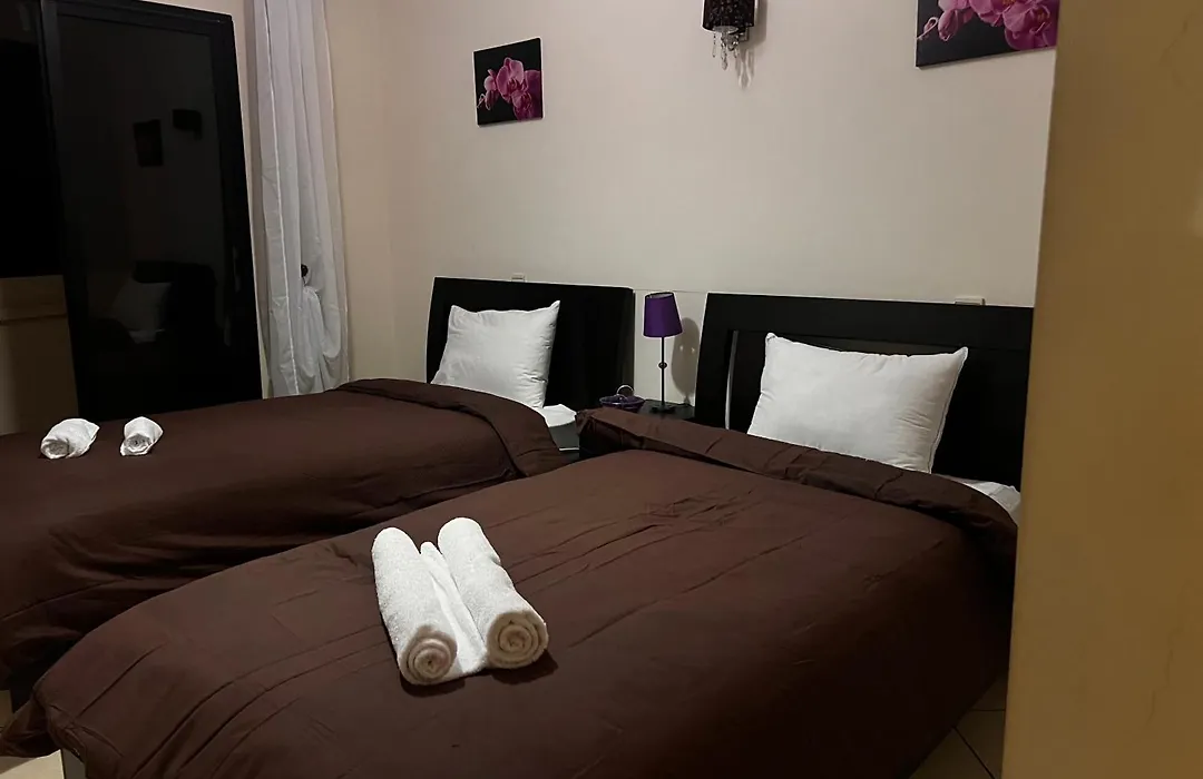 Magnifique Appartement Spacieux Confort Propre Familial 2 Chambres Salon Et Salle A Manger A 20Mn A Pied De Place Jemaa El Fina 4 Piscines Dans Espace De Golf A 12 Mn En Voitures L Entree Est Gratuit Pour La Clientele Ouvert Entre 10H Et 20H-1
