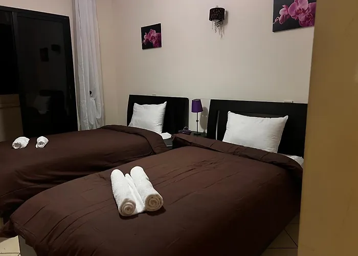 Magnifique Appartement Spacieux Confort Propre Familial 2 Chambres Salon Et Salle A Manger A 20Mn A Pied De Place Jemaa El Fina 4 Piscines Dans Espace De Golf A 12 Mn En Voitures L Entree Est Gratuit Pour La Clientele Ouvert Entre 10H Et 20H